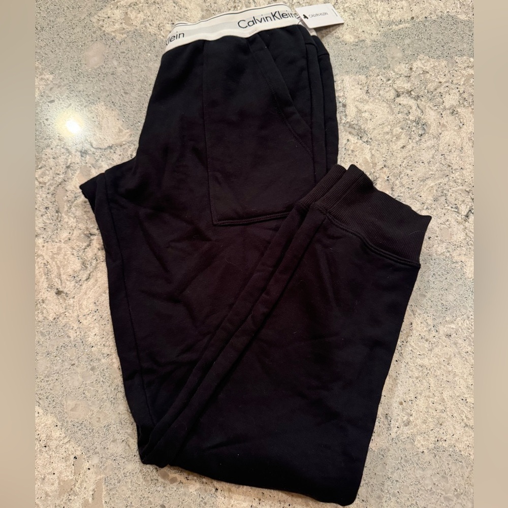 NWT Calvin Klein Black Joggers with classic CK band and deep pockets